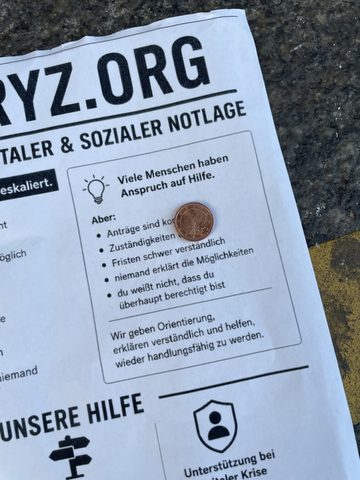 vectoryz.org-Flyer mit Cent-Münze, Detail Soforthilfe-Sektion